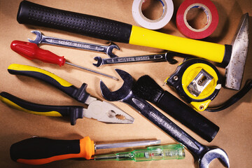 Utensils on Brown Background