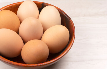 Organic chicken eggs on the table. Eggs are good for everyone and health. Farm products, natural eggs.