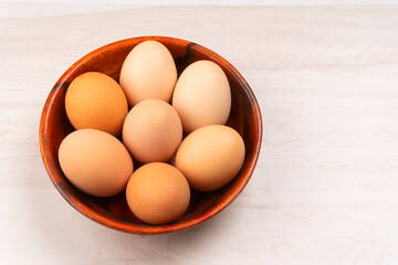 Organic chicken eggs on the table. Eggs are good for everyone and health. Farm products, natural eggs.