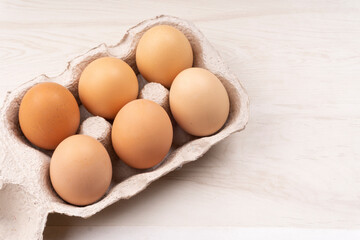 Organic chicken eggs on the table. Eggs are good for everyone and health. Farm products, natural eggs.
