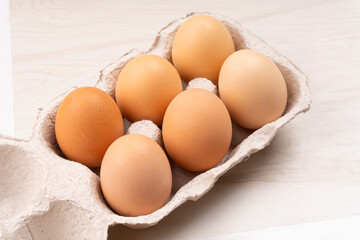 Organic chicken eggs on the table. Eggs are good for everyone and health. Farm products, natural eggs.
