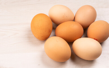 Organic chicken eggs on the table. Eggs are good for everyone and health. Farm products, natural eggs.
