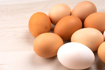 Organic chicken eggs on the table. Eggs are good for everyone and health. Farm products, natural eggs.