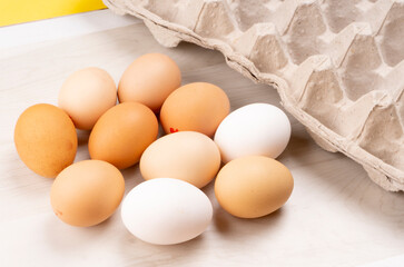 Organic chicken eggs on the table. Eggs are good for everyone and health. Farm products, natural eggs.