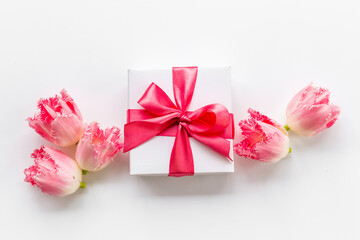 Happy Mothers day. Pink flowers with white gift box