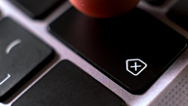 Worker deletes information pressing backspace button on notebook keyboard extreme close view. Person works on modern laptop computer