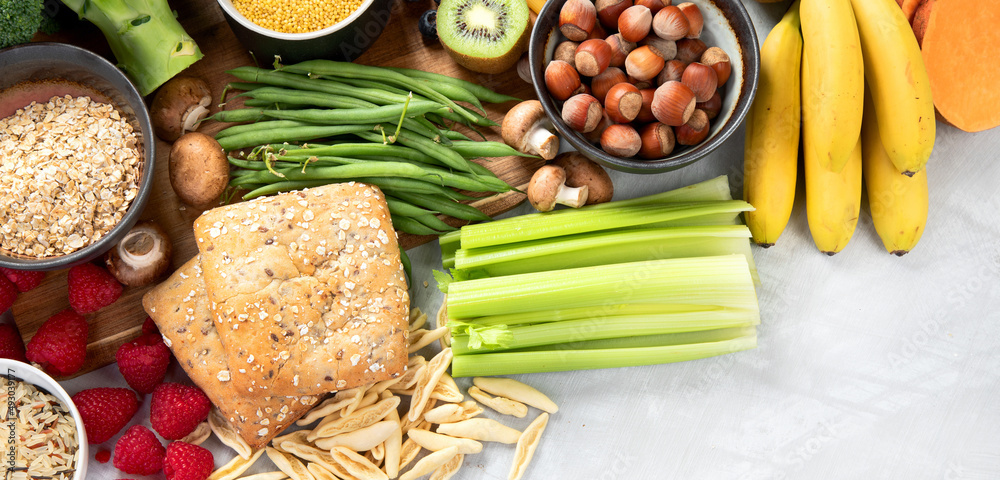 Wall mural Foods high in fiber on gray background.