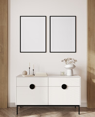 Fototapeta premium 3d render of a modern mockup interior with black frames on beige wall with white sideboard and a vase with small flowers.