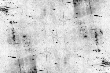 Black and white old metal sheet with scattered grunge texture and spots