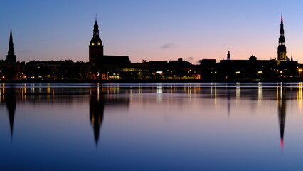 Fototapeta na wymiar Dawn over the Daugava in spring with Old Riga as a backdrop