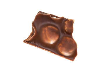piece of chocolate with peanuts isolated on white background