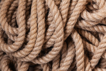 Pile of thick jute rope, close-up.