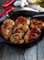 Pan fried chicken breast with spicy pepper, garlic, honey sauce