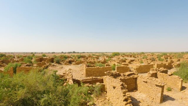 4K shot of the abandoned Kuldhara village near Jaisalmer, Rajasthan, India. Panning shot of old ruins of haunted Kuldhara village. 