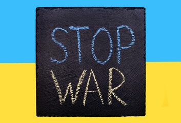 Blue with a yellow flag of Ukraine and a sign with the inscription stop war. A call for help to the...