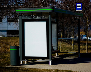 Outdoor advertising billboard at the bus stop.