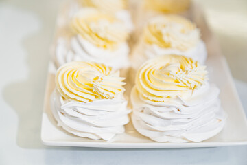 cream decorates to Anna Pavlova cakes. delicious desserts