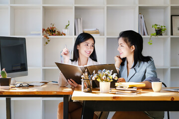 Consultation concept, contract signing, insurance, female employee holding a pen is offering contract documents to customers to sign important documents.