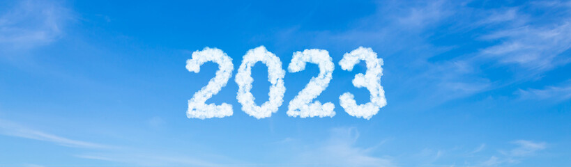 Year 2023 word made of clouds on blue sky background