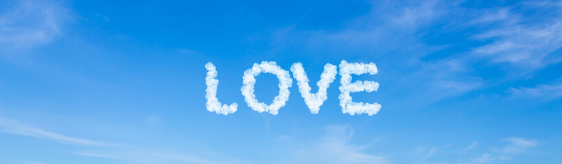 Love word made of clouds on blue sky background
