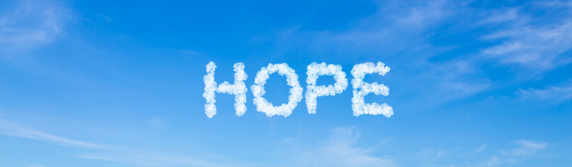 Hope word made of clouds on blue sky background