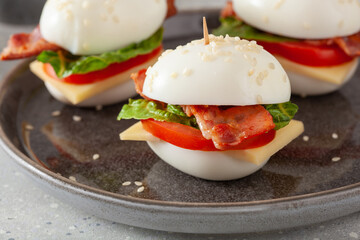 blt egg sandwich with cheese bacon lettuce. healthy keto low carb diet