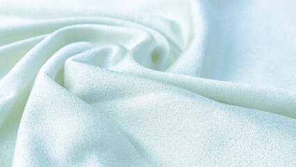Close-up texture of green fabric or microfiber cloth in green color. Fabric texture of green...