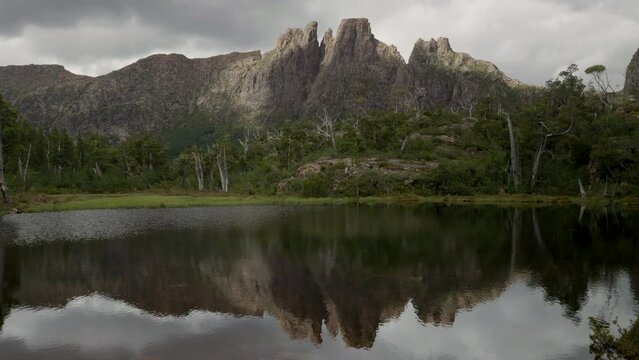 tilt up clip of mt geryon and the pool of memories on a summer afternoon at the labyrinth in cradle mountain-lake st clair national park of tasmania, australia