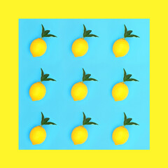 Lemon fruit with green leaves on blue background with yellow border. Minimal design for good health and weight loss concept. High in antioxidants, bioflavonoids and vitamin c.
