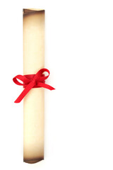 Old parchment scroll rolled up and tied with red ribbon. Document, manuscript or diploma concept. On white background with copy space.