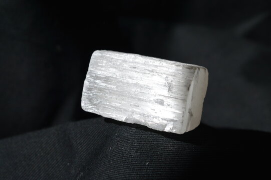 Natural selenite  isolated on black background
