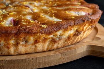 Pie with cherry-apple filling. The side of a large pie is visible.
