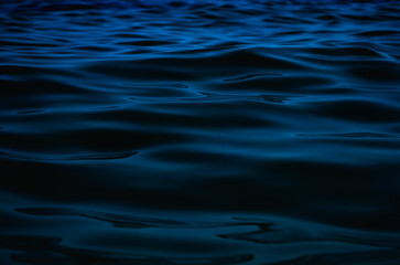 Sea abstract background dark blue surface of water