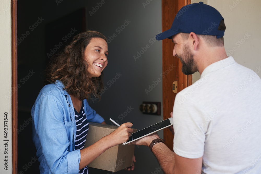 Poster we end every service with our customers smiling. shot of a young woman using a digital tablet to sig