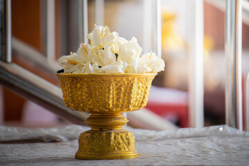 Paper flowers are used in Thai funeral ceremonies.
