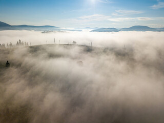 Foggy summer morning in the Ukrainian Carpathians. Aerial drone view.