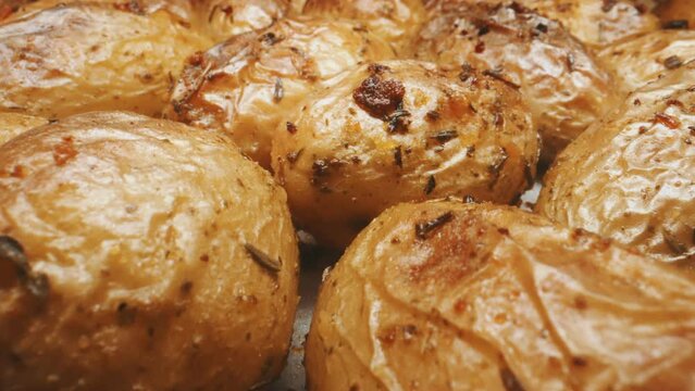 Macro view of baked potatoes with dill.
