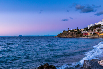 View of the north bay of Ceuta at dusk - sunset with the rock of Gibraltar in the background