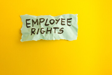 Words employee rights handwritten on yellow background