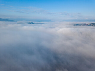 Obraz na płótnie Canvas Morning fog in the Ukrainian Carpathians. Aerial drone view.