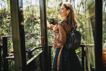 Woman Traveling To Adventure By Retro Train