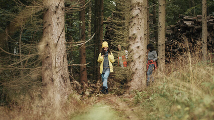 Friends hiking in a dense forest