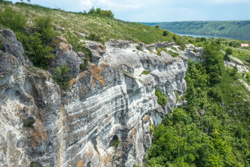 Magnificent aerial view on small tributary of the Dniester River with picturesque shores. National Nature Park Podilski Tovtry, the Dniester River, Ukraine. Beautiful view from flying drone.