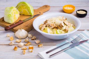 A vegetarian caesar salad made with special ingredients, fresh greens and grilled chicken