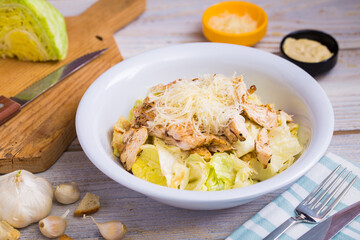 A vegetarian caesar salad made with special ingredients, fresh greens and grilled chicken