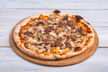 The pizza is prepared with special ingredients. delicious fresh-from-the-oven snack