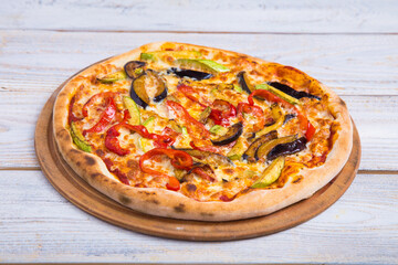 The pizza is prepared with special ingredients. delicious fresh-from-the-oven snack
