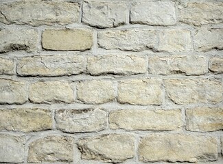 Beige sandstone, wall of stone, background.