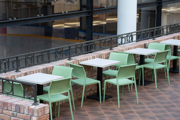 Interior of wooden table in food court shopping mall.