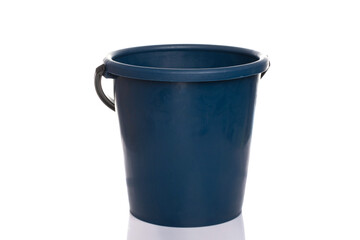 dark blue plastic bucket on a white isolated background